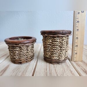 Vintage handcrafted woven baskets. made from natural fibers and wood trim